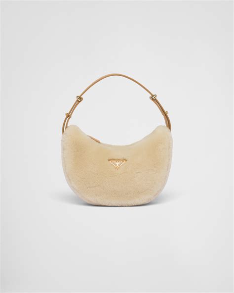 prada arque shearling|PRADA Shearling Arque Shoulder Bag Ecru Noisette.